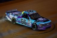 Joey Logano in the Weather Guard Truck Race on Dirt